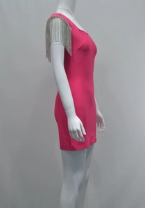 Detail of rose red bandage dress featuring silver rhinestone fringe on shoulder