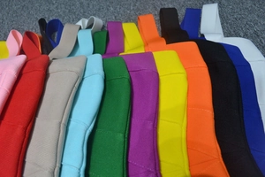 Texture detail of elastic ribbed bandage fabric available in eleven vibrant colors