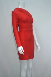 Detail of red one-shoulder bandage dress showing compression fabric and sleeve texture