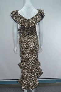 Macro shot of back detail showing ruffled hem and leopard print pattern on a fishtail dress
