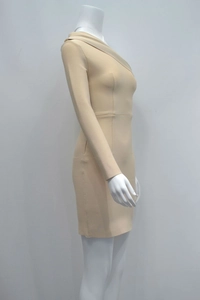 Detail of nude one-shoulder bodycon dress showing textured fabric and asymmetrical sleeve