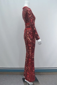 Close-up detail of burgundy lace evening jumpsuit with sequins and corset back