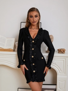 Detail of elegant gold pearl buttons and pleated ruffle trim on a black V-neck bandage dress