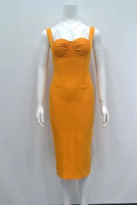 Detail of orange bodycon midi dress featuring sweetheart neckline and ruched bust area