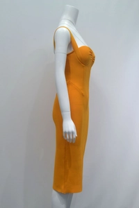 Detail of bright orange bodycon bandage dress with ruched bust and wide straps