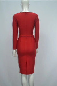 Back view of red midi dress showing the invisible zipper and slit on the hem