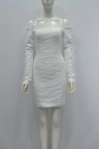 Detailed view of the sheer mesh pleats and off-shoulder sleeve on this white bandage dress