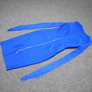 Detail of royal blue bandage dress featuring long sleeve tassels and silver back zipper