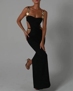 Sultry black bandage maxi dress with gold heart charms and waist cut-outs for evening gala