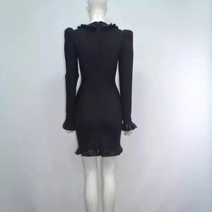 Back view of black long sleeve mini bandage dress with ruffle trim and zipper