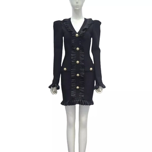 Elegant black long sleeve V-neck bandage mini dress with gold buttons and ruffle trim