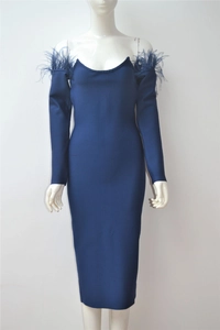 Detailed close-up of dark blue off-shoulder dress with feather trim on the sleeves
