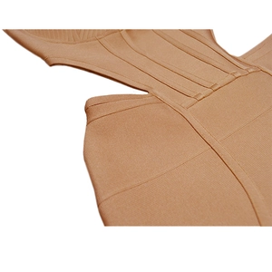 Detailed macro view showing the criss-cross hollow out waist of the bandage dress