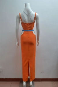 Detailed back view of orange bandage dress featuring waist cut-outs and blue belt accent
