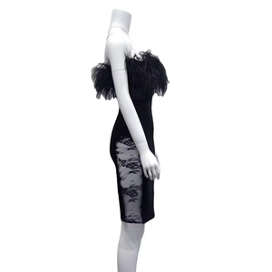 Elegant black strapless bandage dress with feather trim and side lace detailing