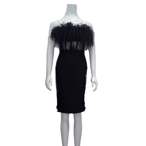 Elegant black strapless bandage dress with feather trim and sheer mesh paneling