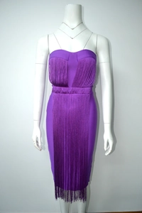 Detail of purple strapless bandage dress featuring long vertical fringe layers and slim fit