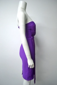 Detail view of purple strapless bandage dress with long swaying fringe trim for parties