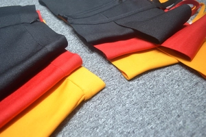 Detailed view of high-stretch bandage fabric texture with hidden side zipper detail