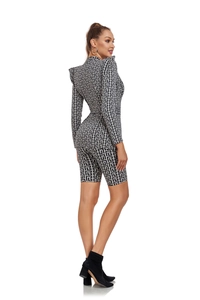 Side view of two-piece jacquard set featuring black and white maze pattern and slim belt