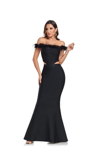Detail of elegant black bandage set with ostrich feather neckline and mermaid maxi skirt