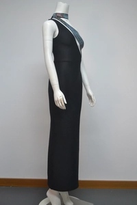 Detail of sparkling rhinestone embellishments on a black sleeveless party dress