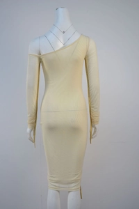 Detail view of the back of a slim-fit yellow off-shoulder mesh dress with long ribbon sleeves