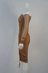 Close-up of ruched mesh fabric on a nude off-shoulder long sleeve bodycon midi dress
