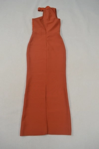 Detail of orange high neck bandage dress featuring side sequins and back slit hem