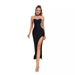Elegant black halter evening dress with shimmering rhinestones and mesh side cut-outs