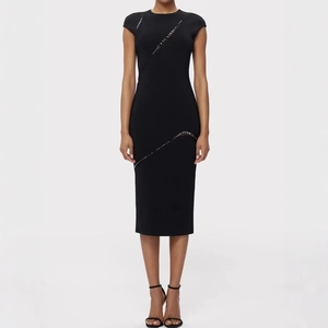 Detail of the diagonal crystal sequins on this slim fit black midi bandage dress