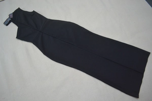 Close-up of sparkling rhinestone neckline on a black sleeveless bodycon evening dress