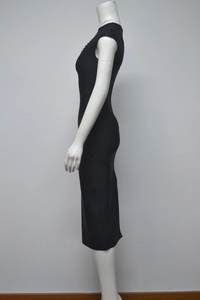 Side view of black sleeveless bandage dress with rhinestone details on slim fit mannequin