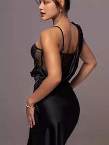 Elegant black satin corset midi dress with sheer mesh panel and draped details for party