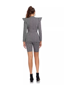 Women's two-piece suit with jacquard maze pattern including blazer and shorts from the back