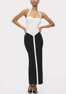 Detail of elegant black and white halter neck bandage maxi dress with mermaid silhouette
