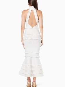 Elegant white backless halter mermaid maxi dress with ruffled tiers for formal parties