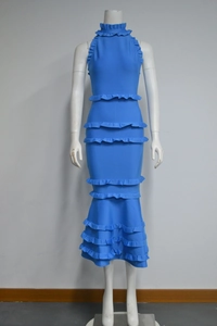 Detail of blue backless mermaid dress featuring multi-layer ruffled tiers and halter neck