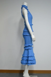 Detail of blue backless bandage dress featuring layered ruffles and a chic halter neck