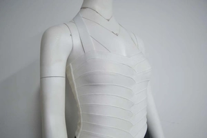 Detail of the white bandage material and bodycon stitching on this halter top