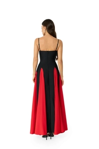 Close-up of the elegant backless design and invisible zipper on the contrast evening dress