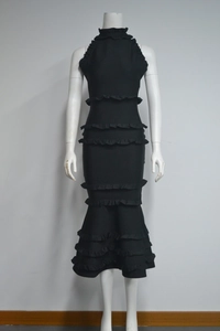 Detail of a black sleeveless party dress featuring tiered ruffles and a standing collar