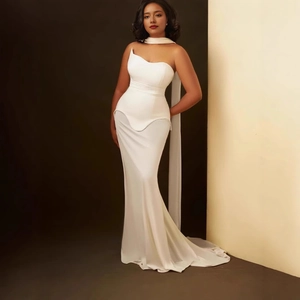 Detail of elegant white strapless satin gown with asymmetrical neckline and matching scarf