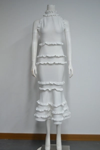 Detailed view of white backless party dress featuring multi-layered ruffle bandages