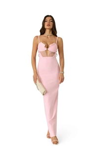 Detailed view of pink bodycon dress with deep V-neck, mesh panels and thin straps