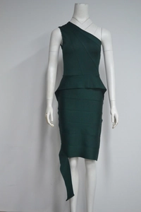 Detailed texture of dark green bandage fabric with peplum waist and asymmetric shoulder