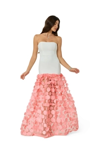 Close-up of 3D pink petal applique design on a strapless evening party dress