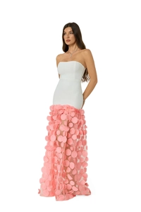 Detail of white strapless bodice and pink 3D flower petal appliqués on the tiered dress