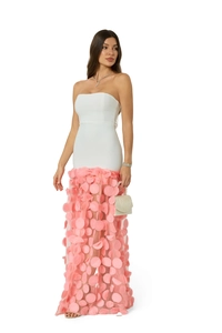 Detail of pink 3D floral petal skirt on a white strapless evening party gown