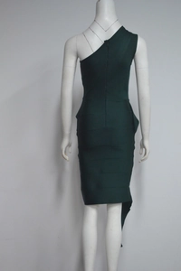 Detail of the back zipper and bandage texture on this emerald green one-shoulder dress